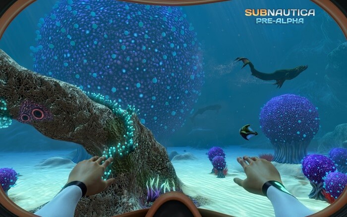 subnautica game screenshot from the main character view in diving suit underwater